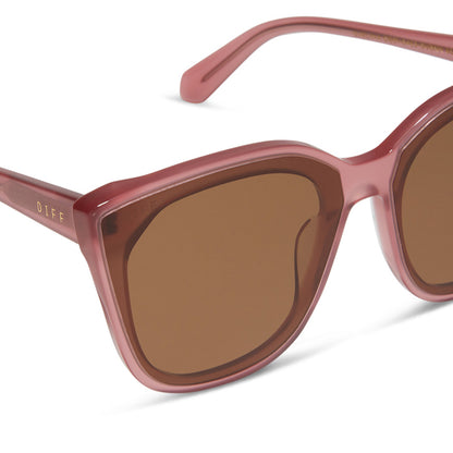 diff eyewear featuring the gjelina cat eye sunglasses with a guava frame and brown lenses detailed view