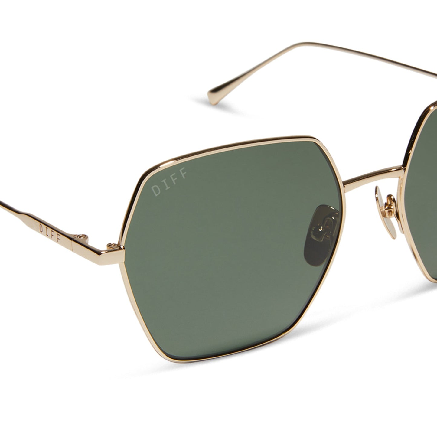 diff eyewear featuring the harlowe hexagon sunglasses with a gold frame and g15 polarized lenses detailed view