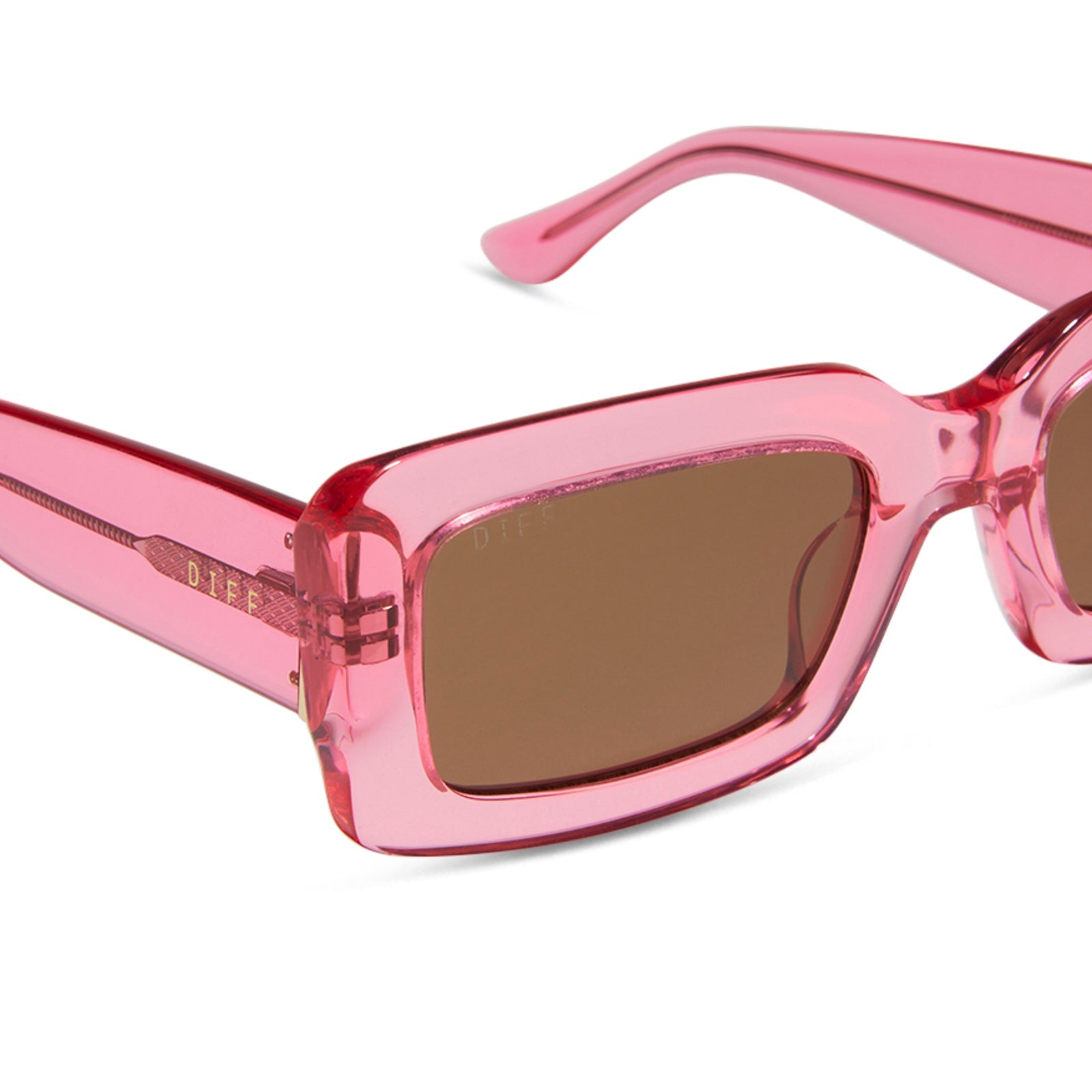 diff eyewear indy square sunglasses with a candy pink crystal frame and brown lenses detailed view