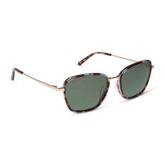 jena sims x diff eyewear featuring the hope cateye sunglasses with a blue color pop frame and g15 polarized lenses angled view