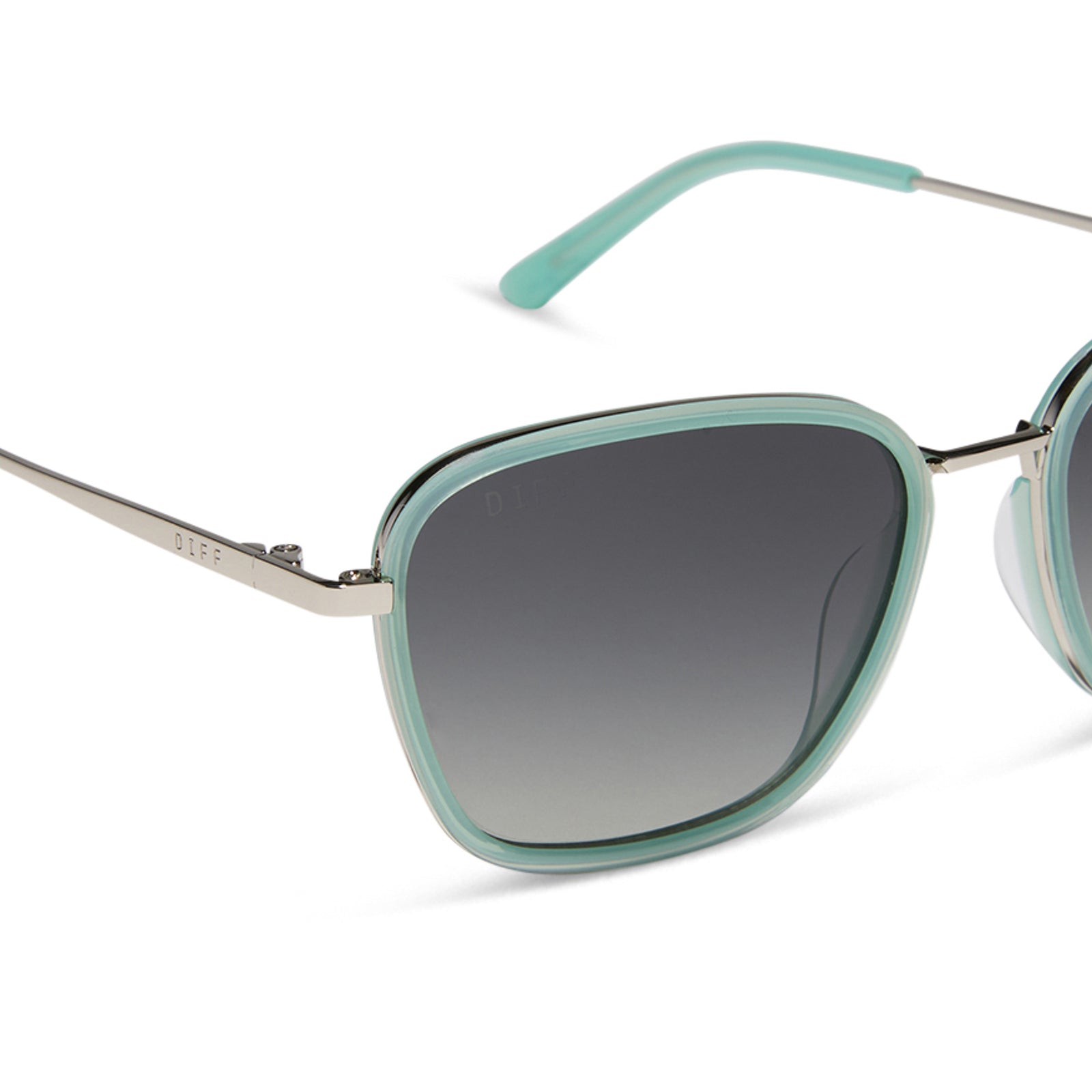 jena sims x diff eyewear featuring the hope cat eye sunglasses with a bronco blue frame and grey gradient polarized lenses detailed view