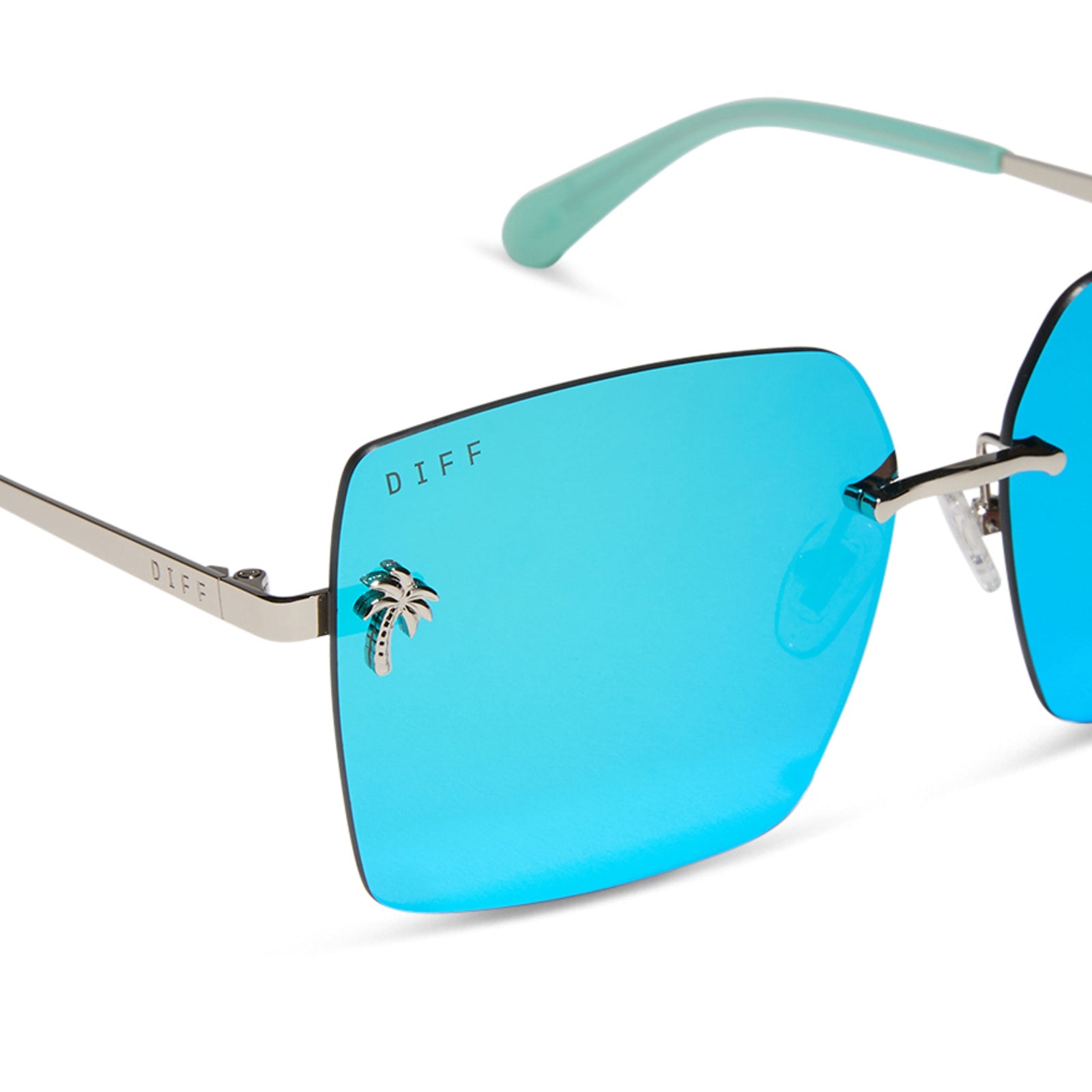 jena sims x diff eyewear featuring the rookie square sunglasses with a bronco blue and silver metal frame and teal mirror lenses detailed view