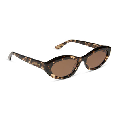 jessie james decker x diff eyewear featuring the dolce bella oval sunglasses with a espresso tortoise frame and brown lenses angled view