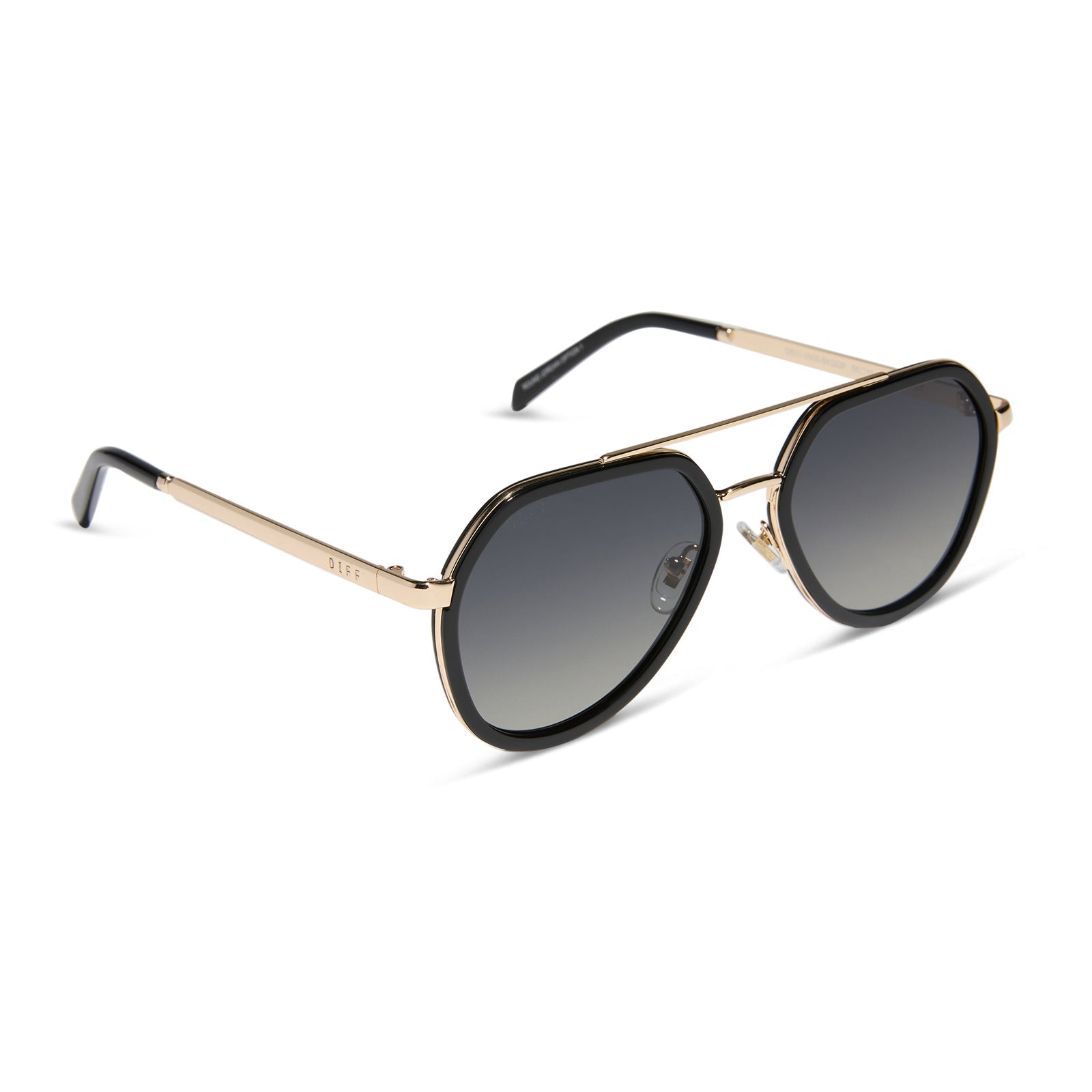 diff eyewear featuring the joey round sunglasses with a black & gold metal frame with grey gradient polarized lenses angled view