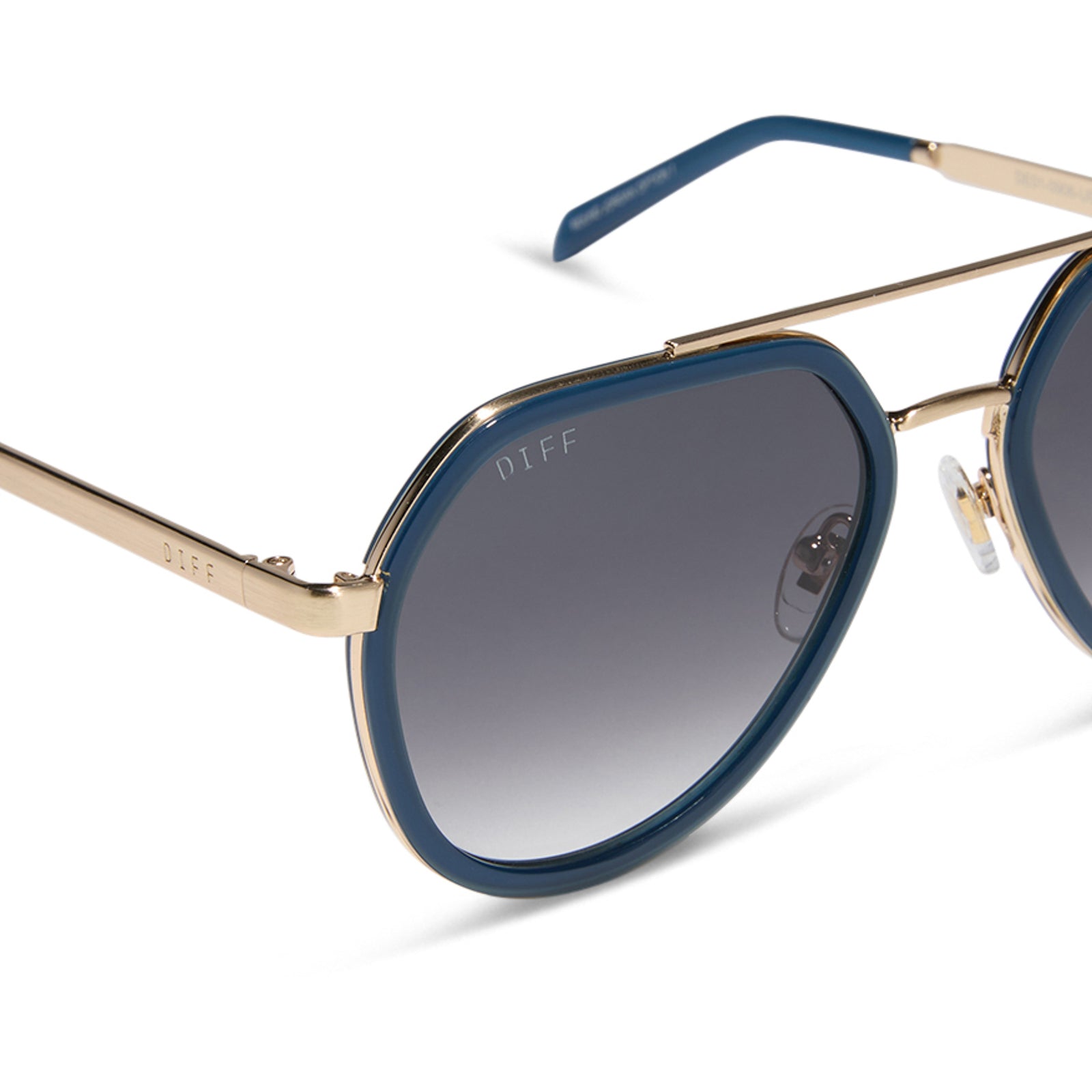 diff eyewear featuring the joey round sunglasses with a clubhouse blue & brushed gold metal frame with grey gradient lenses detailed view