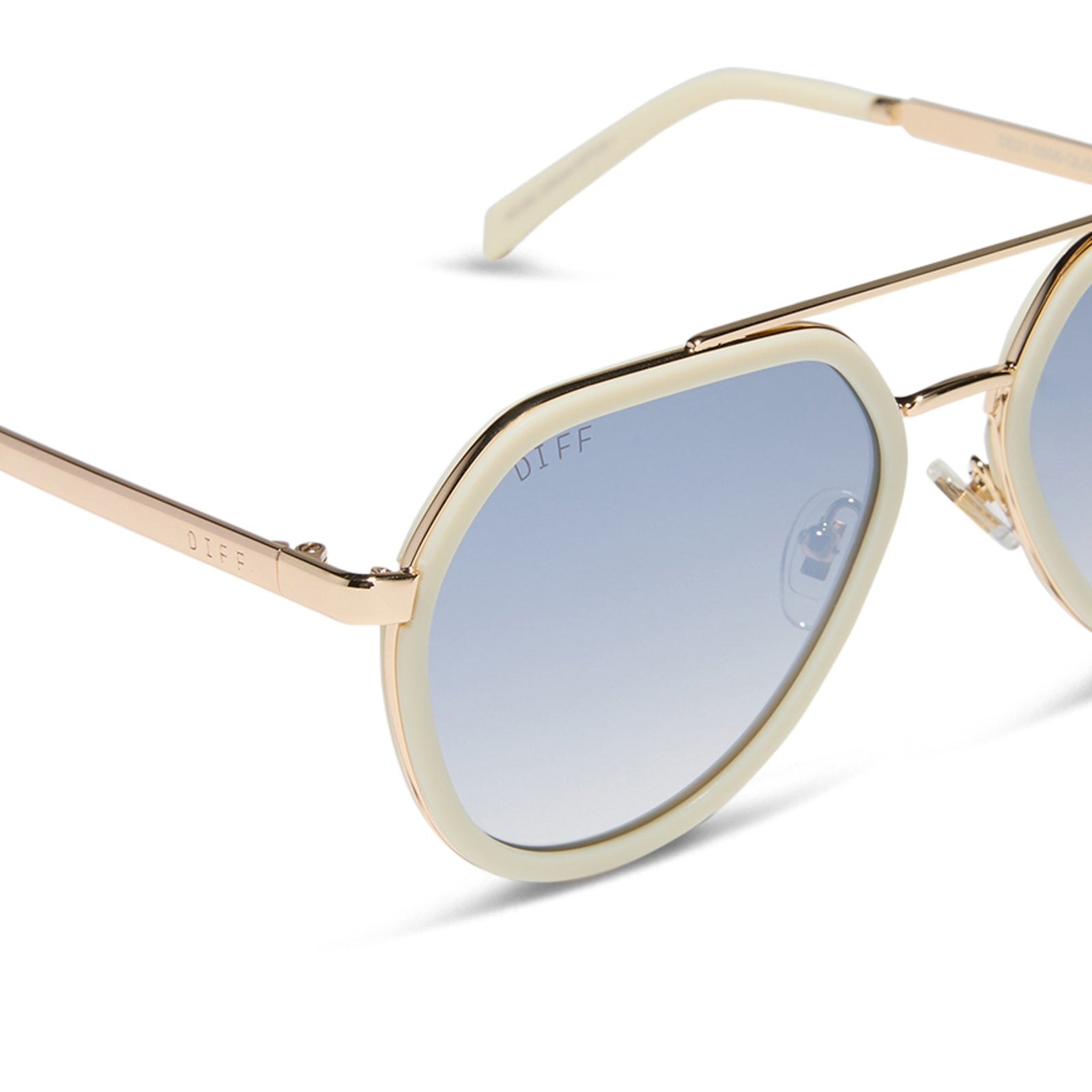 diff eyewear featuring the joey round sunglasses with a courtside ivory & gold metal frame with blue slate gradient flash lenses detailed view