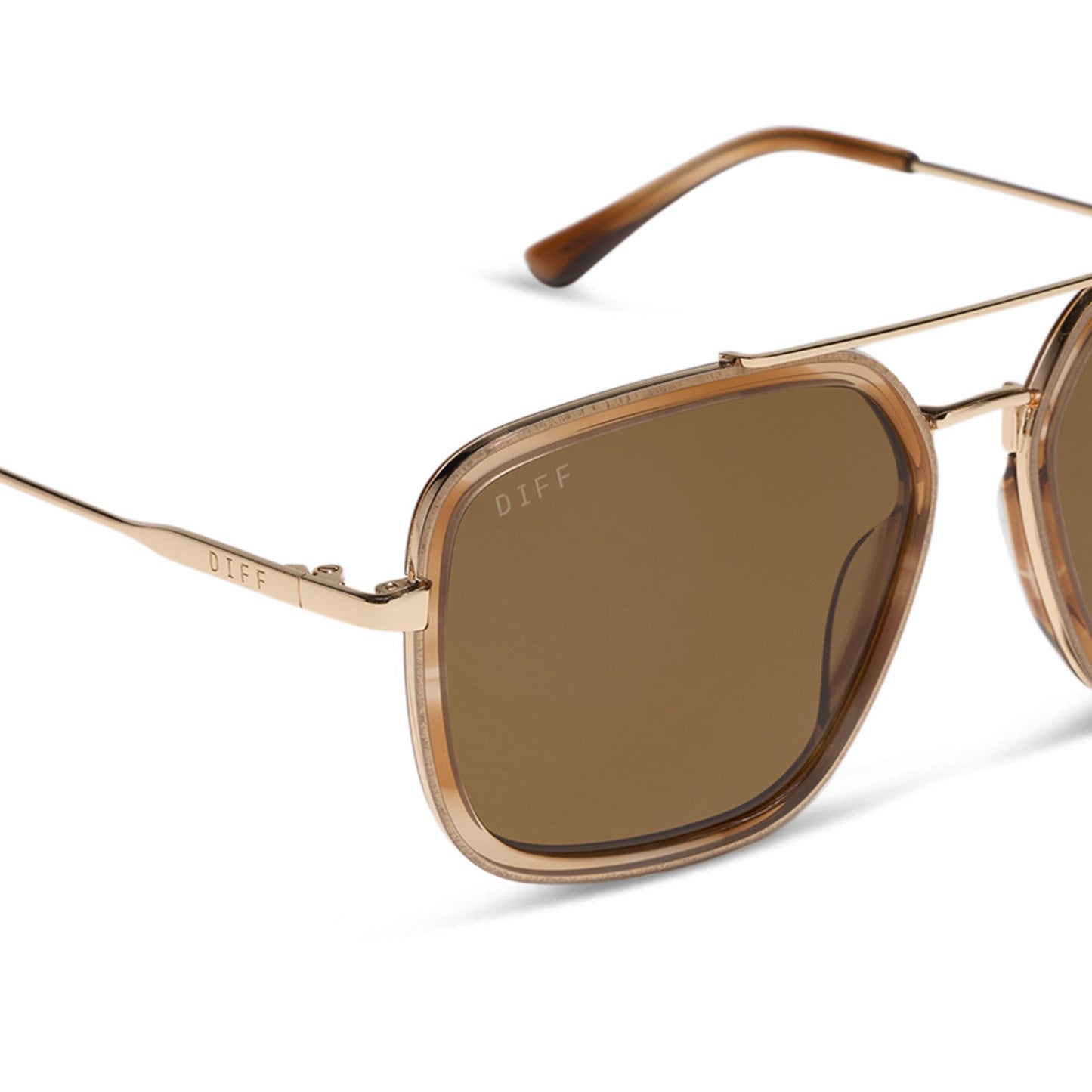 diff eyewear jordan navigator sunglasses with a tortoise frame, gold temples, and brown lenses detailed view