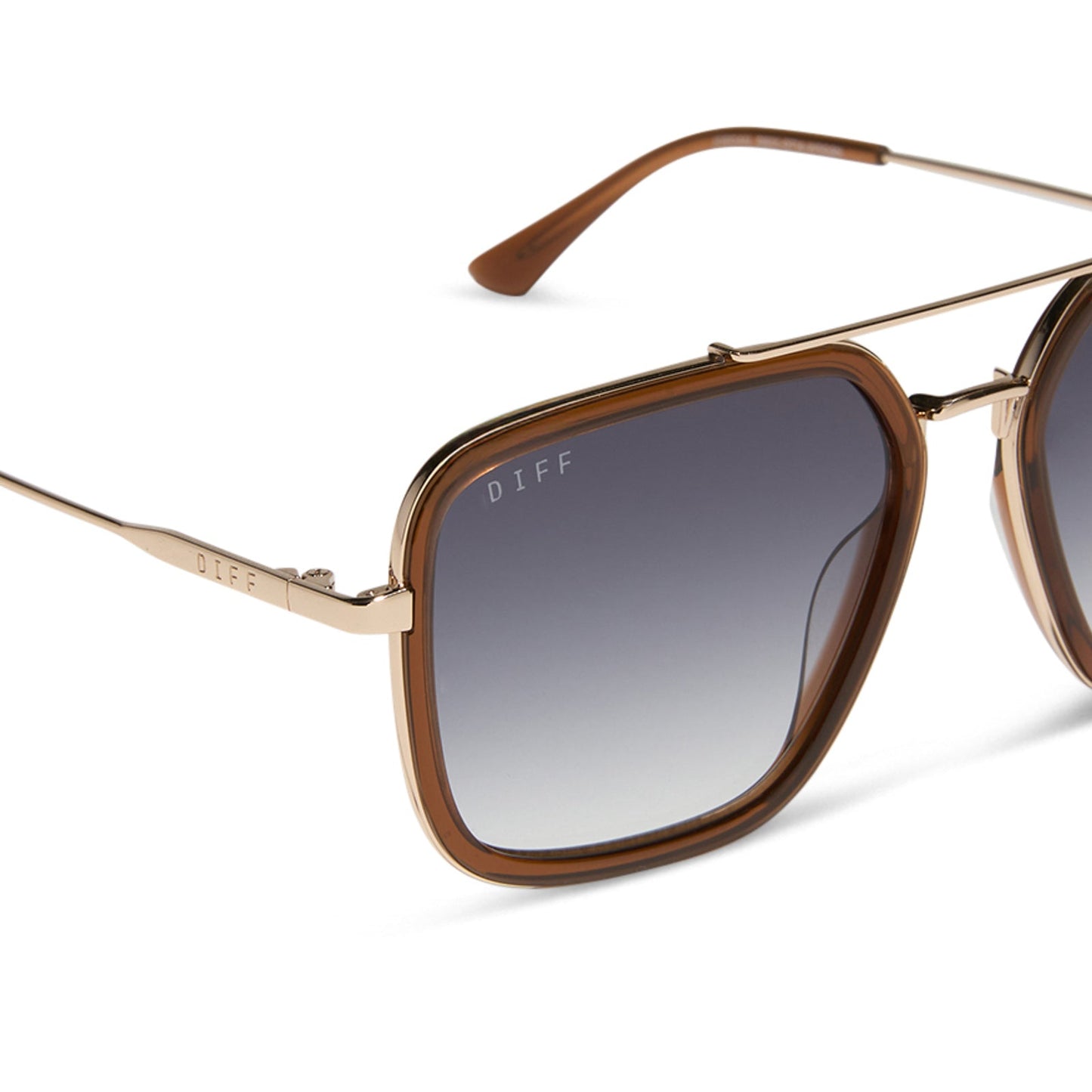 diff eyewear featuring the jordan navigator sunglasses with a whiskey with gold frame and grey gradient lenses detailed view