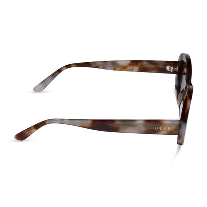 diff eyewear lainey oval sunglasses with a dove tortoise acetate frame and brown polarized lenses side view