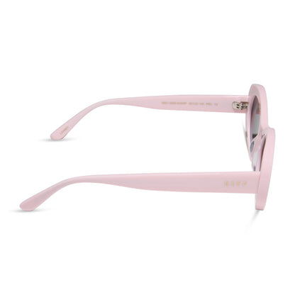 diff eyewear featuring the lainey oval sunglasses with a powder pink frame and grey polarized lenses side view