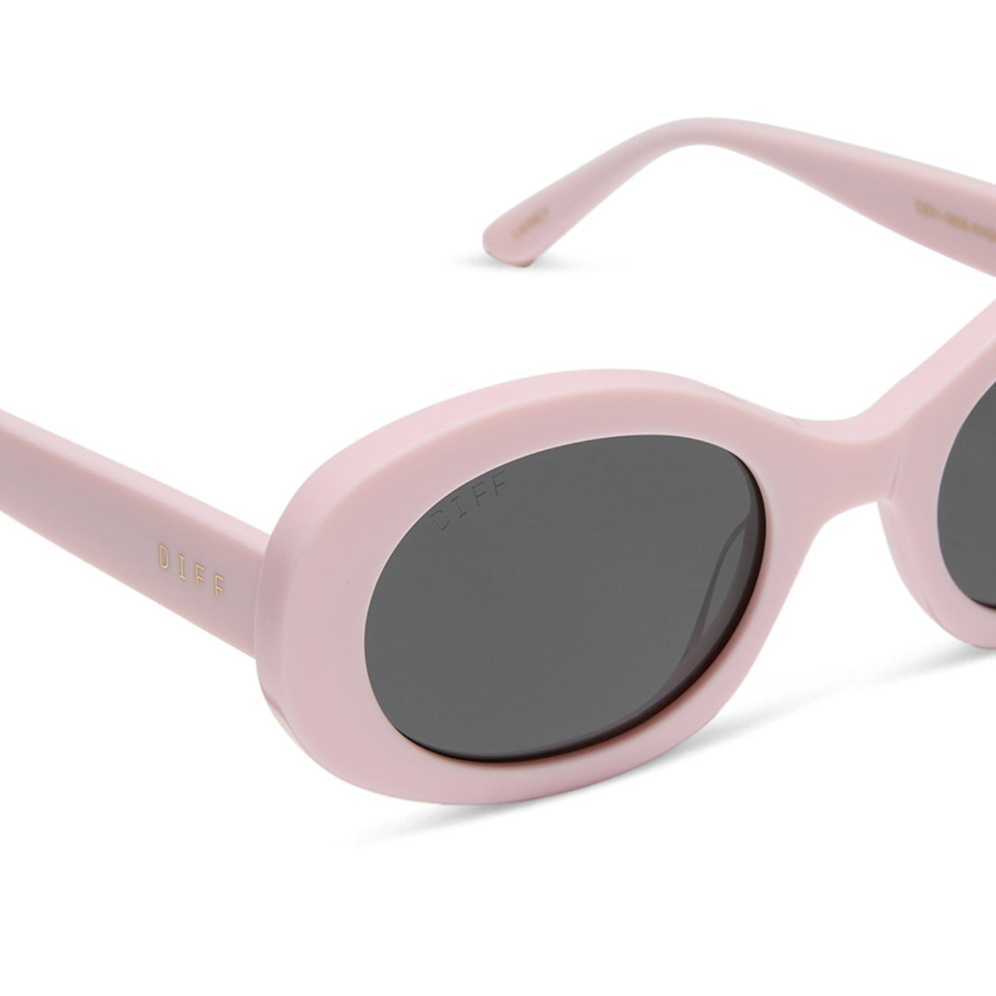 diff eyewear featuring the lainey oval sunglasses with a powder pink frame and grey polarized lenses detailed view