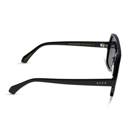 diff eyewear featuring the layton navigator sunglasses with a black acetate frame and grey gradient polarized lenses side view