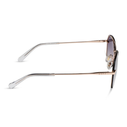 diff eyewear featuring the lenox xs aviator sunglasses with a champagne gold (light gold) frame and blue slate gradient with silver flash lenses side view