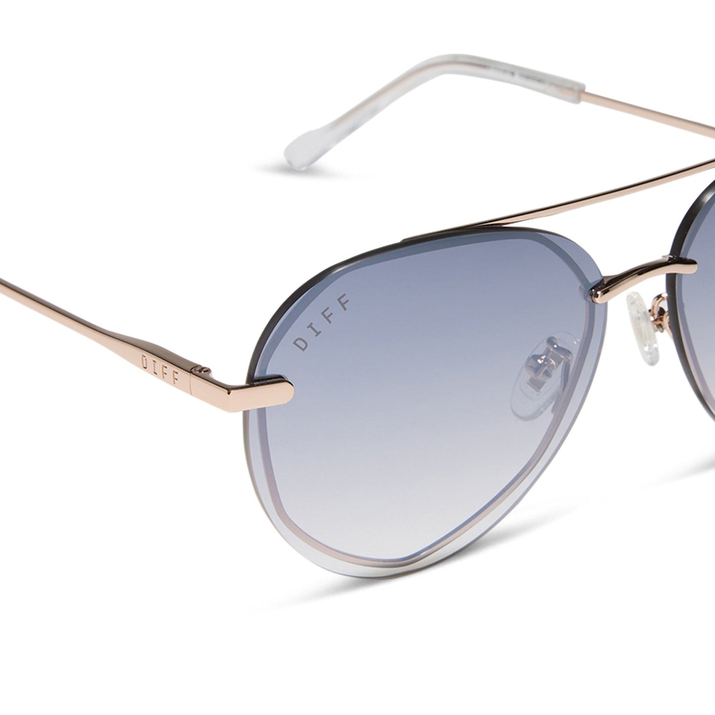 diff eyewear featuring the lenox xs aviator sunglasses with a champagne gold (light gold) frame and blue slate gradient with silver flash lenses detailed view