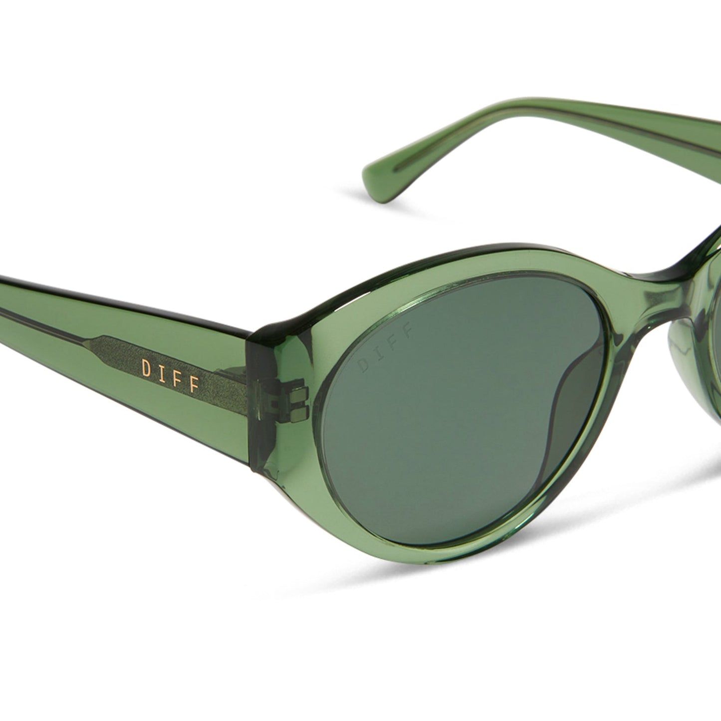 diff eyewear featuring the linnea oval sunglasses with a sage green crystal frame and g15 polarized lenses detailed view