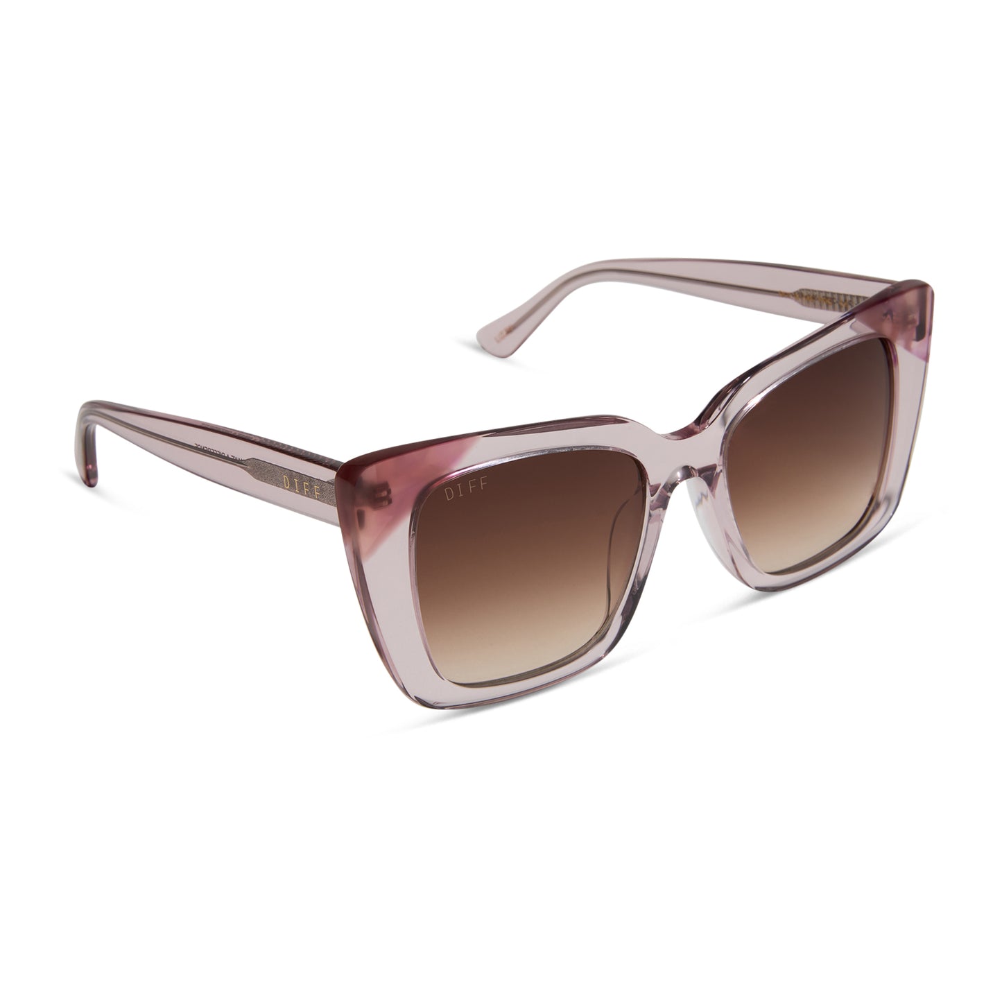 diff eyewear featuring the lizzy cat eye sunglasses with a light pink crystal + fleur pink tort tips frame and brown gradient lenses angled view