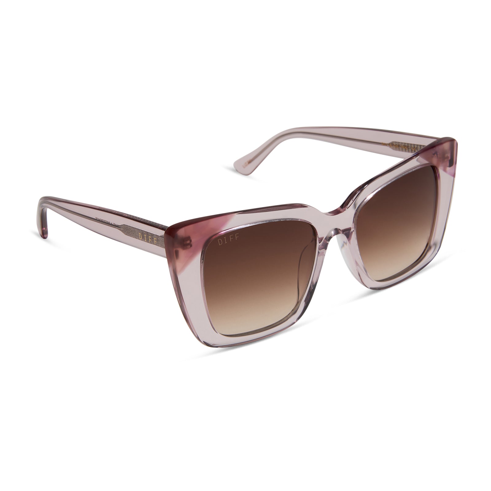 diff eyewear featuring the lizzy cat eye sunglasses with a light pink crystal + fleur pink tort tips frame and brown gradient lenses angled view