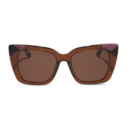diff eyewear featuring the lizzy cat eye sunglasses with a whiskey + torino tortoise frame and brown lenses front view