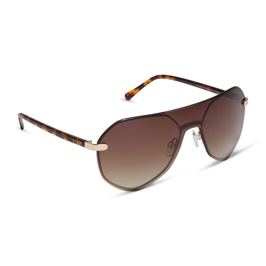 diff eyewear lonnie oversized aviator sunglasses with a gold metal frame and brown gradient polarized lenses angled view