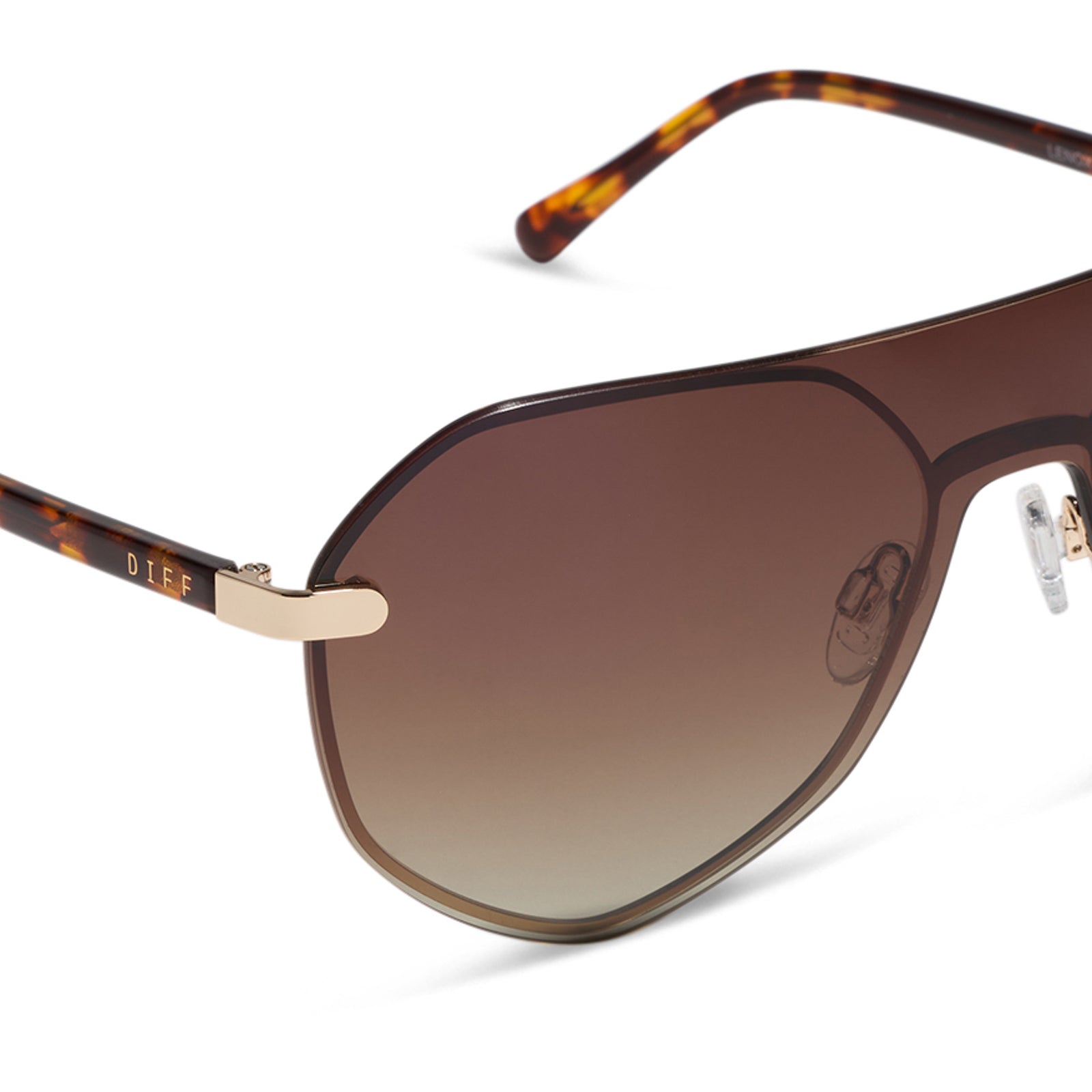 diff eyewear lonnie oversized aviator sunglasses with a gold metal frame and brown gradient polarized lenses detailed view