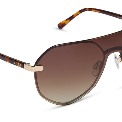 diff eyewear lonnie oversized aviator sunglasses with a gold metal frame and brown gradient polarized lenses detailed view