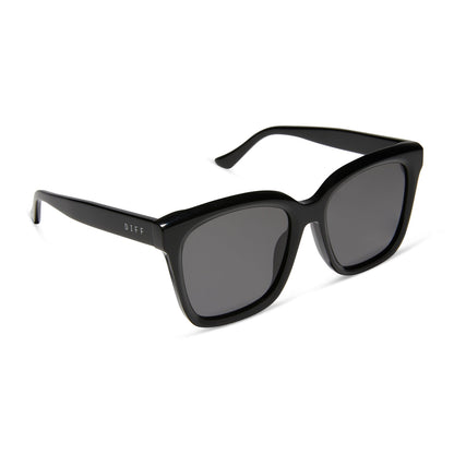diff eyewear meredith square sunglasses with a black acetate frame and grey lenses angled view