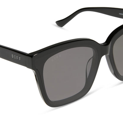diff eyewear featuring the meredith ii square sunglasses with a black frame and grey lenses detailed view