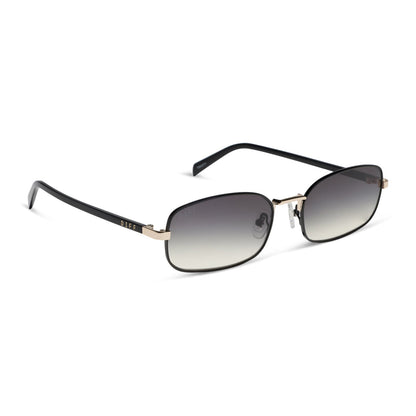 rachael kirkconnell x diff eyewear naomi square sunglasses with a black and gold metal frame and grey gradient lenses angled view