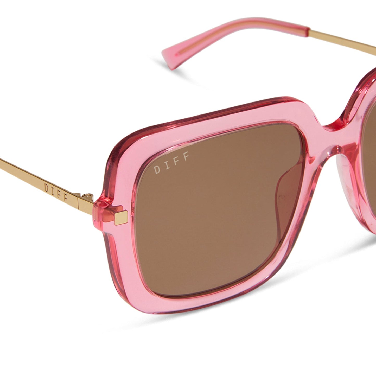 diff eyewear sandra square oversized sunglasses with a candy pink crystal acetate frame and brown lenses detailed view