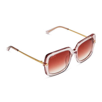diff eyewear sandra square sunglasses with a light pink crystal frame and peach dusk gradient lenses detailed view