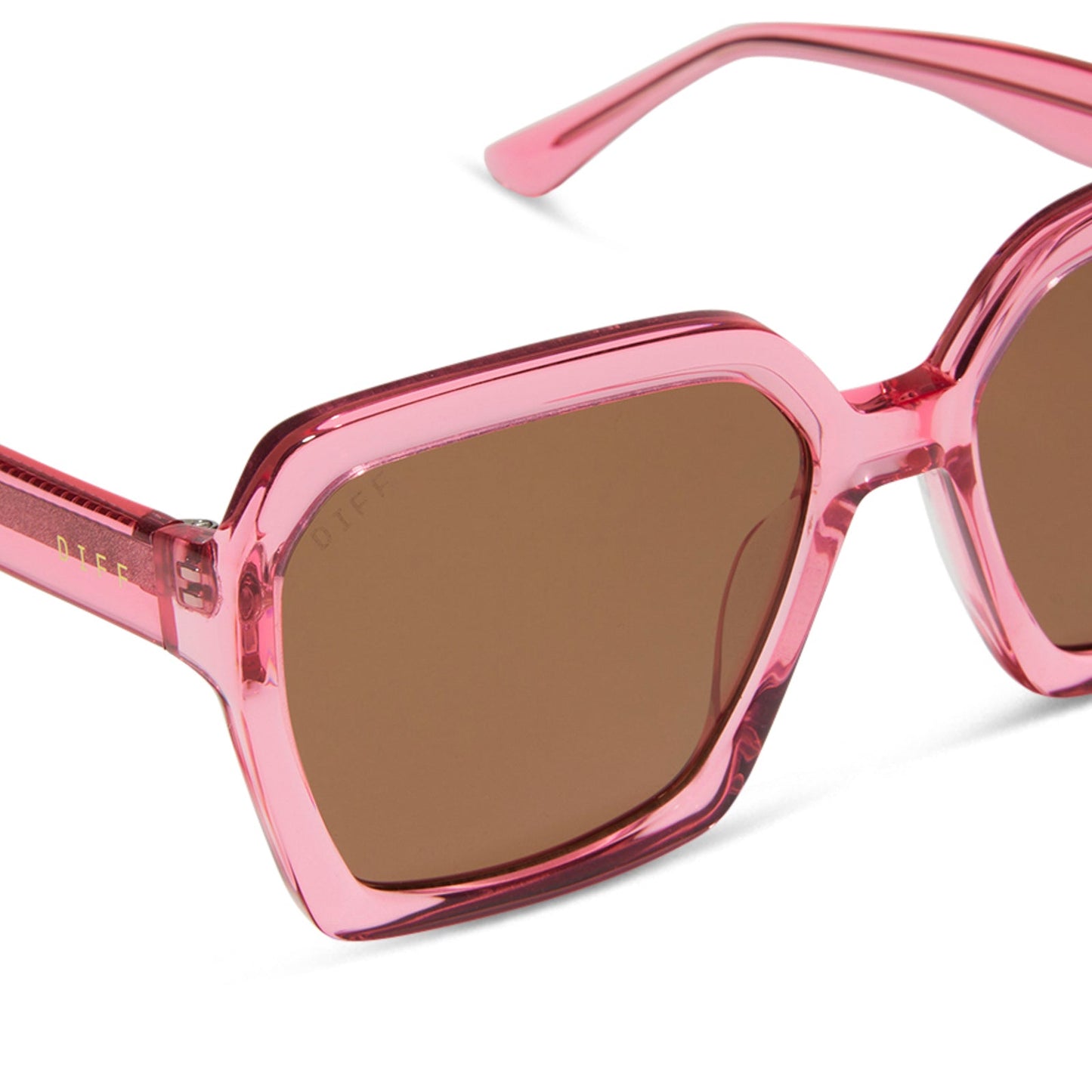 diff eyewear sloane square oversized sunglasses with a candy pink crystal acetate frame and brown lenses detailed view