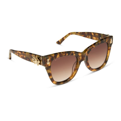 the white lotus x diff eyewear featuring the hawaii cat eye sunglasses with a coconut palm tortoise frame and brown gradient lenses angled view