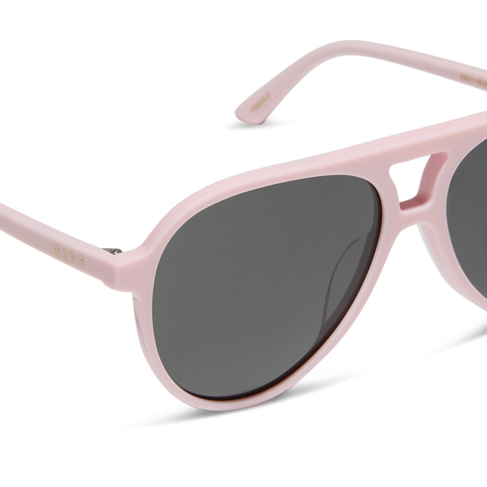 diff eyewear featuring the tosca ii aviator sunglasses with a powder pink frame and grey lenses detailed view