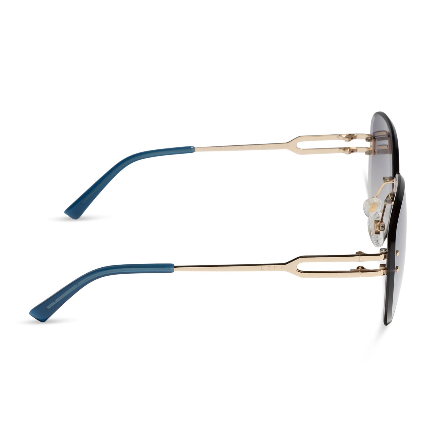 diff eyewear featuring the trista aviator sunglasses with a gold frame and slate blue gradient flash lenses side view