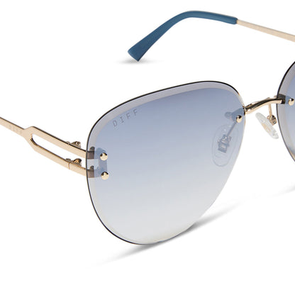diff eyewear featuring the trista aviator sunglasses with a gold frame and slate blue gradient flash lenses detailed view