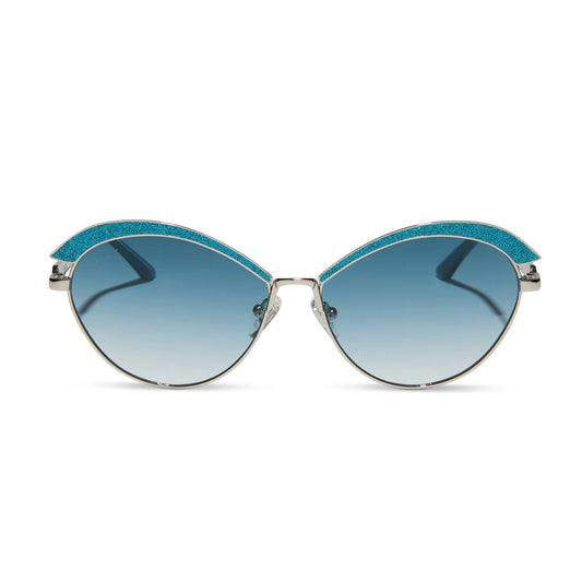 wednesday x diff eyewear featuring the bianca cat eye sunglasses with a silver frame and teal gradient lenses front view