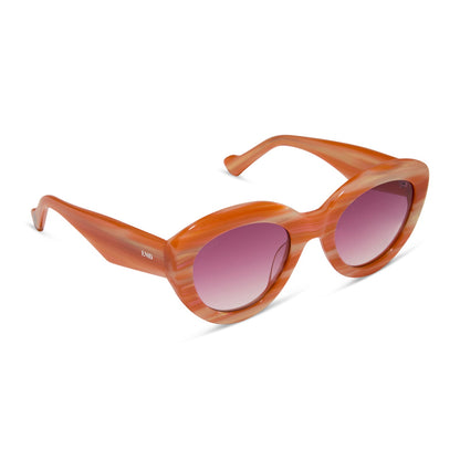 wednesday x diff eyewear featuring the enid sinclair cat eye sunglasses with a orange pink stripe frame and wine gradient lenses detailed view