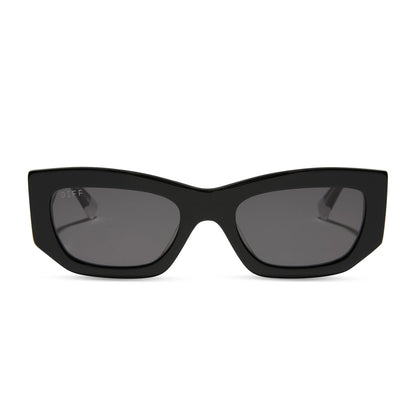 wednesday x diff eyewear featuring the wednesday addams cat eye sunglasses with a black frame and grey lenses front view