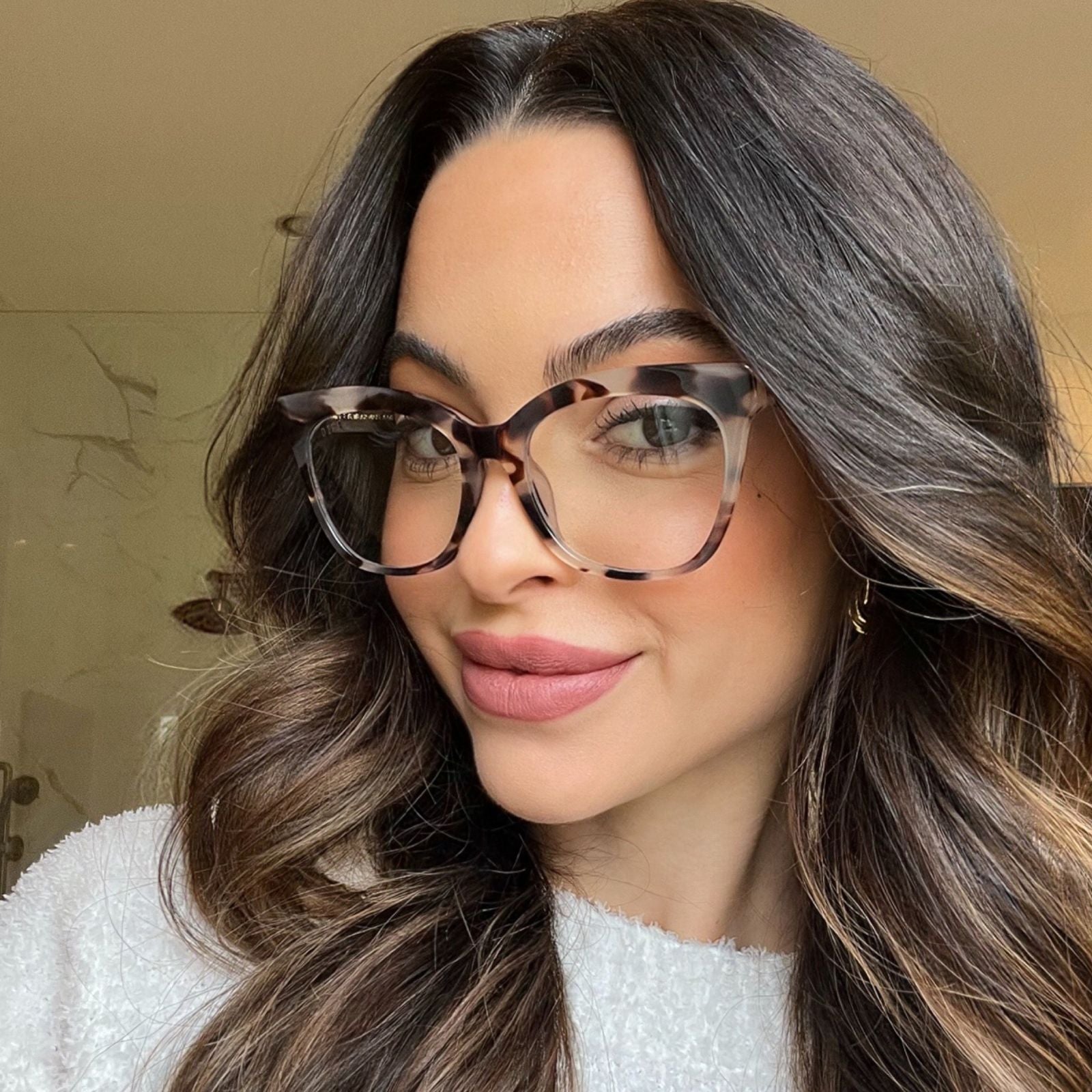 customer content - alicia mya brunetter model wearing cream tortoise print eyeglasses