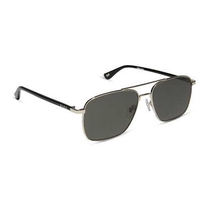 yellowstone x diff eyewear featuring the rip wheeler navigator sunglasses with a silver frame and grey polarized lenses angled view