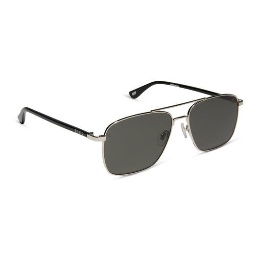 yellowstone x diff eyewear featuring the rip wheeler navigator sunglasses with a silver frame and grey polarized lenses angled view