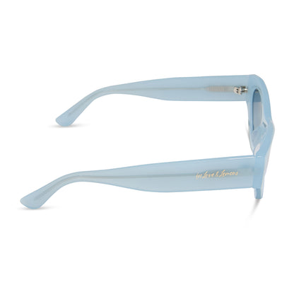 for love and lemons x diff eyewear featuring the lucy cat eye sunglasses with a pastel blue frame and blue gradient polarized lenses side view