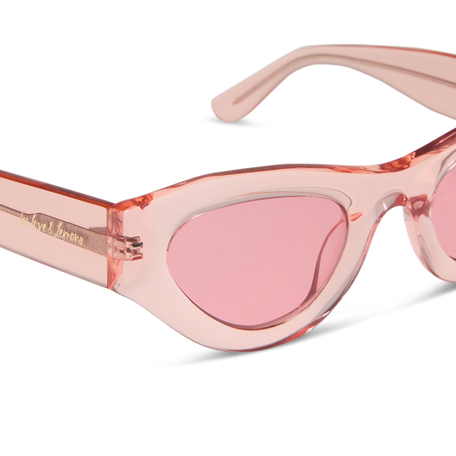 for love and lemons x diff eyewear featuring the lucy cat eye sunglasses with a pastel pink frame and rose lenses detailed view