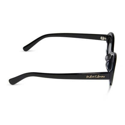 for love and lemons x diff eyewear featuring the sabrina oval sunglasses with a black frame and grey polarized lenses side view