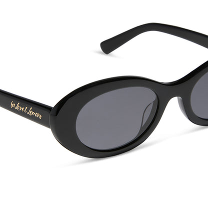 for love and lemons x diff eyewear featuring the sabrina oval sunglasses with a black frame and grey polarized lenses detailed view