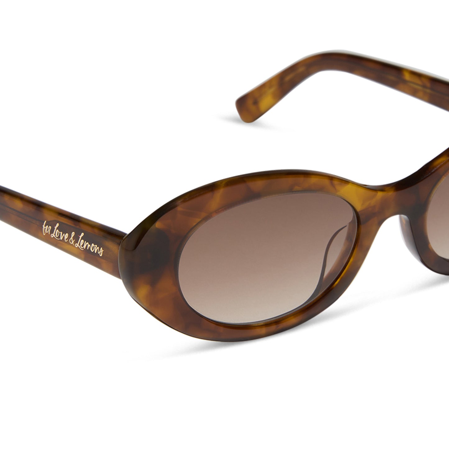 for love and lemons x diff eyewear featuring the sabrina oval sunglasses with a honey tortoise frame and brown gradient lenses detailed view