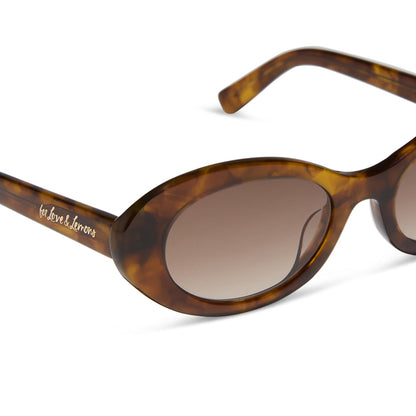 for love and lemons x diff eyewear featuring the sabrina oval sunglasses with a honey tortoise frame and brown gradient lenses detailed view