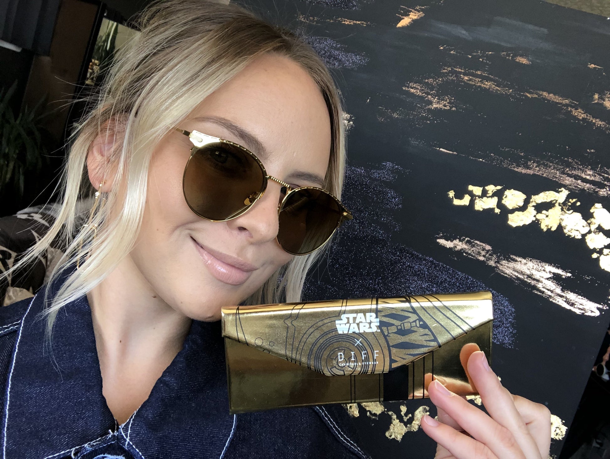 Customer Content - lauren kawano wearing the star wars C-3PO sunglasses